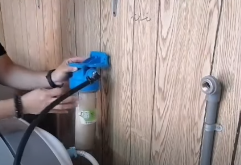 Attach cold and hot water filters with a wall