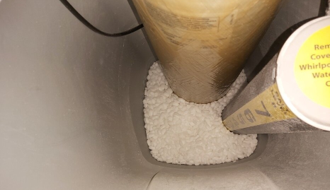 How often should I check the salt level in my water softener