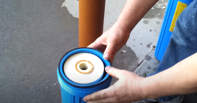 Remove The Water Filter Housing Bottom